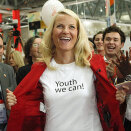 Crown Princess Mette-Marit displays her T-shirt as she attends the opening of the youth pavilion at the 18th World Aids Conference in Vienna  (Photo: Herwig Prammer, Reuters)